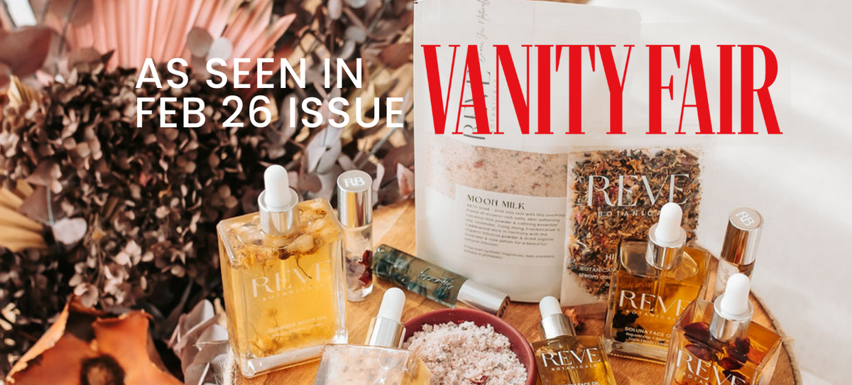 Vanity Fair magazine cover with Reve products on a wooden table.